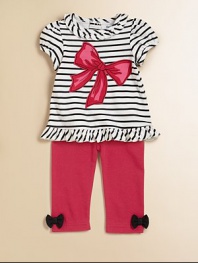 A pretty striped tunic is embellished with a bold bow and paired with soft, stretch-cotton pants to create a timelessly sweet look. Top Ruffled round necklineShort puff sleevesBack snapsRuffled hem Pants Elastic hemCottonMachine washImported Please note: Number of snaps may vary depending on size ordered 