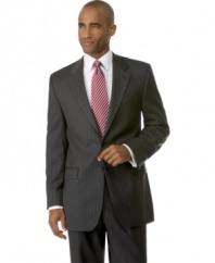 Modern style that's perfectly in-line with the classics. Wool two-button blazer features crisp, clean chalk stripes on a rich solid ground. Notch lapel. Chest welt pocket. Front flap pockets. Center-back vent.