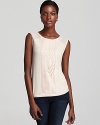 Exude easy femininity in a BCBGMAXAZRIA top with pleating at the bodice for a touch of charm this season.