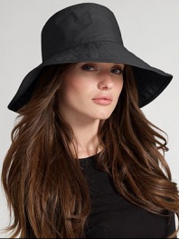 Floppy, water-resistant coated cotton is stylish for rainy days. Signature logo detail Brim, about 4¼ wide One size fits most Cotton; spot clean Imported