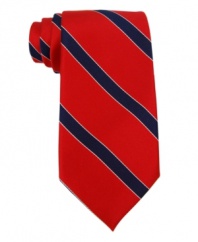 Tommy Hilfiger elevates a sporty look to a sophisticated new standard with this striped silk tie.