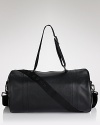 Style on the go. We love the elegant simplicity of BOSS Black's compact, burnished leather weekender bag.