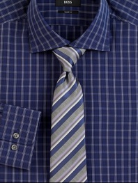 An elegant mix of stripes sharpen a classic silk tie woven in Italy. About 3 wideSilkDry cleanMade in Italy