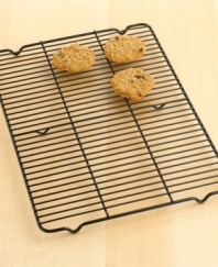 Fresh-out-of-the-oven treats are hard to resist; cool them more quickly with this hassle-free rack. Constructed of aluminized steel to resist rusting, its nonstick surface ensures easy cleaning and food release. Lifetime warranty.