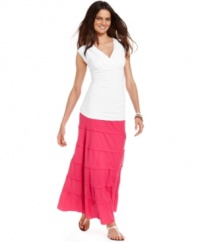 A gauzy maxi skirt from INC gets a fresh look with subtle seamed details. Pair with a tank for an easy summer outfit.