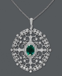 Introducing the unique styles of Brasilica by Effy Collection. This stunningly ornate pendant features an intricate, scrolling pattern decorated by round-cut diamonds (3/8 ct. t.w.) that highlight an oval-cut emerald (1-1/8 ct. t.w.). Set in 14k gold. Approximate length: 18 inches. Approximate drop length: 1-2/3 inches. Approximate drop width: 1-1/5 inches.