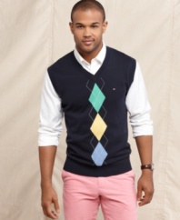 A classic pattern gets a modern upgrade to complement your contemporary preppy look with this argyle vest from Tommy Hilfiger.