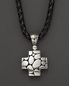 A pebbled sterling silver cross brings bold contrast to braided leather. From the John Hardy Kali Collection.