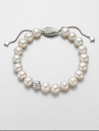 From the Spiritual Bead Collection. Luminous white freshwater pearls on a sterling silver box chain with sterling silver cabled bead accents. 8mm white freshwater pearlsSterling silverDiameter, about 7.75 adjustableBead closureImported 