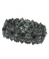 Completely modern with a vintage vibe. Faceted, black jet stones and black crystals add baroque appeal to the filigree setting of hematite-plated mixed metal. Bracelet by 2028 stretches to fit wrist. Approximate diameter: 7 inches.