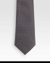 Patterned tie woven in fine Italian silk.About 3.1 wideSilkDry cleanMade in Italy