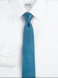 Modern elegance expertly crafted in smooth Italian silk.About 3 wideSilkDry cleanMade in Italy