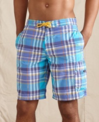 Plaid perfection. Ride a wave of preppy style at the beach this summer with these swim trunks from Tommy Hilfiger.