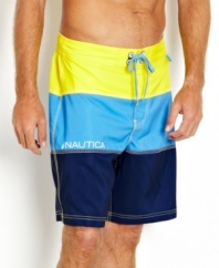 Building block basic. Jump into these colorblocked swim trunks from Nautica then hit the surf in style.