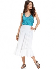 Lighten up this summer in this DKNY Jeans maxi skirt, made from 100% cotton and featuring lace insets and a ruffle at the hem. It sweetens up any top, from tanks to tees!