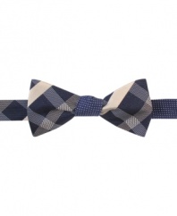 Be the guy in the bowtie. This DKNY style makes it easy to make your mark.