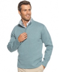 Stay warm with hot style in this handsome 1/4-zip ribbed sweater from Tasso Elba.