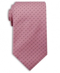 Adding some visual depth to a monochromatic tie, this printed pattern easily complements a solid color button-down shirt.