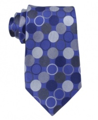 Enter the winner's circle. This spotted tie from Michael Kors will round out your look nicely.