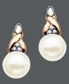Dress up a cocktail dress or a business suit with these elegant stud earrings. 14k rose gold and sterling silver add versatility to a cultured freshwater pearl drop (6 mm) and sparkling diamond accents. Approximate drop: 1/2 inch.