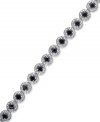 The perfect sparkling serve. This dynamic tennis bracelet features round-cut black diamonds (3 ct. t.w.) in a smooth sterling silver setting. Approximate length: 7-1/4 inches.