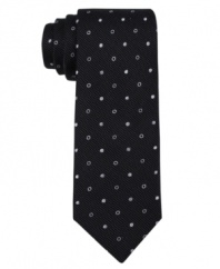 Move into the inner circle. This skinny tie from DKNY will get you instantly spotted.