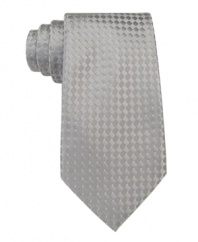 Earn your next tropical vacation in sleek style when you tie on this subtle refined print from Donald Trump.