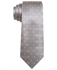 A subtle pattern and skinny construction give this Bar III tie modern edge.