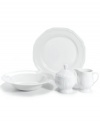 Everything you need to serve with style. Unique geometric shapes and a clean design give Mikasa's Antique White dinnerware and dishes collection a modern sensibility. Serving set not shown.