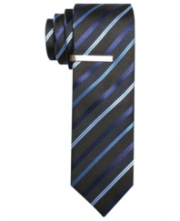 Create a little cool contrast in the concrete jungle with this striped skinny tie from Alfani RED.