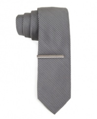 Mix it up with a touch of texture. This slim corduroy tie from Calvin Klein does gives your look a modern twist.