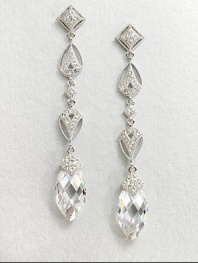 This refined piece features a long drop consisting of various shapes accented in pavé crystals, culminating in a faceted cubic zirconia stone. CrystalsCubic zirconiaRhodium-plated brassLength, about 2.5Post backImported 