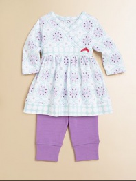 A striking, vivid crystal design adds pizazz to this perky, matching cotton frock and pants set. Bodysuit V-neckLong sleevesBack snapsSkirted hem Pants Elastic waistbandCottonMachine washImported Please note: Number of buttons/snaps may vary depending on size ordered. 