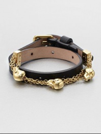 This double wrap style features a chic contrast between supple leather and signature goldtone skulls on a link chain. LeatherGoldtone brassLength, about 16Buckle closureMade in Italy