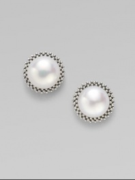 From the Luna Collection. A smooth, round pearl with a sterling silver bead border.8mm pearl Sterling silver Diameter, about ½ Post backs Imported 