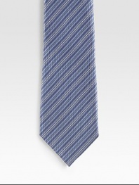 An elegant look handmade with diagonal stripes in fine Italian silk. Silk Dry clean Made in Italy 