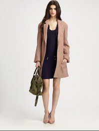 Achieve the right amount of sophistication in this textured, wool-rich coat with a flattering self tie, back vent and slash pockets. Notched collarSingle from besom pocketFront snap closureLong sleevesSelf tie at waistBack ventAbout 34 from shoulder to hem60% wool/25% polyester/15% acrylicDry cleanImportedModel shown is 5'10 (177cm) wearing US size 2.OUR FIT MODEL RECOMMENDS ordering true size. 