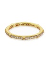 Finished in gold vermeil with delicate sparkles, Crislu's simple cubic zirconia ring is a stackable statement piece.