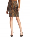 On-point python: Ellen Tracy's pencil skirt is all about the wild details. A bold python print and angled zipper pockets embolden the sleek silhouette.