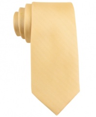 This smooth skinny tie from Tommy Hilfiger is a smart addition to any guy's Monday through Friday rotation.