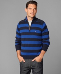 Big bold stripes set this Tommy Hilfiger sweater apart from others in your lineup.