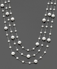 Three tiers of vivacious beauty. This necklace features cultured freshwater pearls (4-8 mm) set in sterling silver. Approximate length: 18 inches. Approximate drop: 2 inches.
