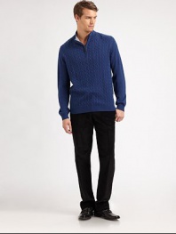 A perfect mix of sporty and preppy, with cable-knit details and an easy half-zip closure.Ribbed mockneck collarHalf-zip frontLong sleeves with ribbed cuffsRibbed hemMerino woolDry cleanImported