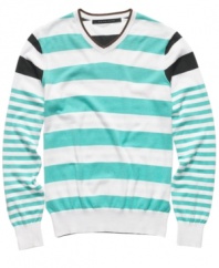 Stripe it rich in your seasonal wardrobe with this bold big and tall sweater from Sean John.