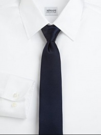 Modern elegance expertly crafted in smooth Italian silk.About 3 wideSilkDry cleanMade in Italy