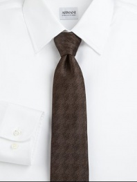 Expertly crafted in Italian silk and finished in a handsome houndstooth pattern.About 3 wideSilkDry cleanMade in Italy