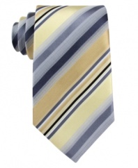 Go bold. A classic striped tie from Kenneth Cole Reaction is punctuated by a power color palette.