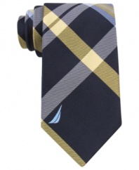 Give any solid shirt a preppy punch with this crisp plaid tie from Nautica.