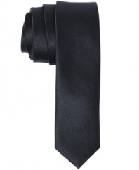 Make a singular, solid statement in your dress wardrobe with this American Rag skinny tie.