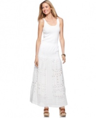 Oversized eyelet modernizes the delicate fabric on this MICHAEL Michael Kors maxi skirt for a look that's more fashion-forward than traditionally feminine!